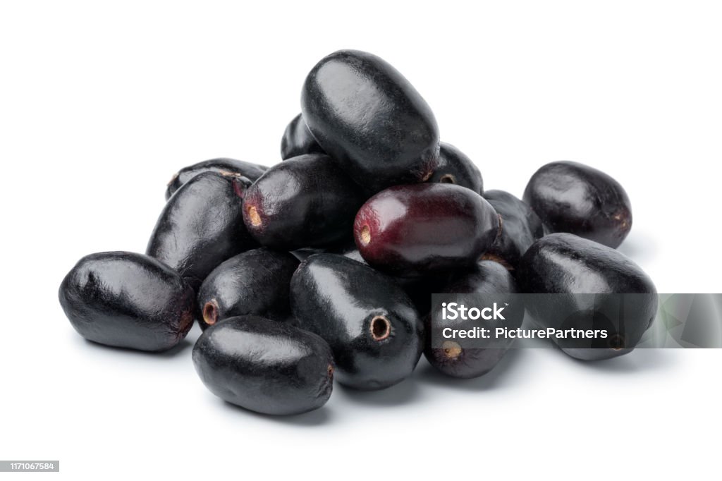 Heap of fresh Jamun berries isolated on white background